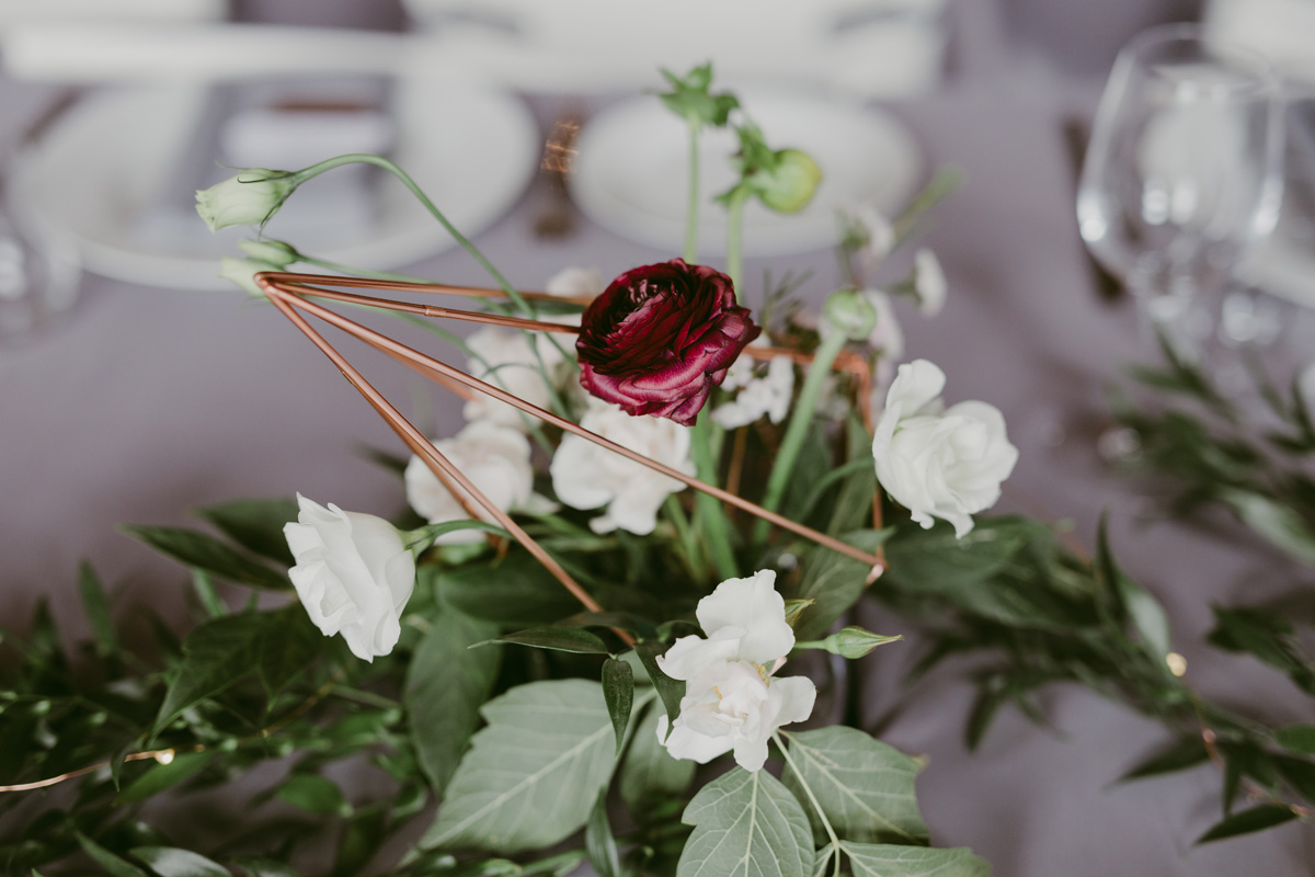 Geometric gold rose wedding details at Orange Art Gallery